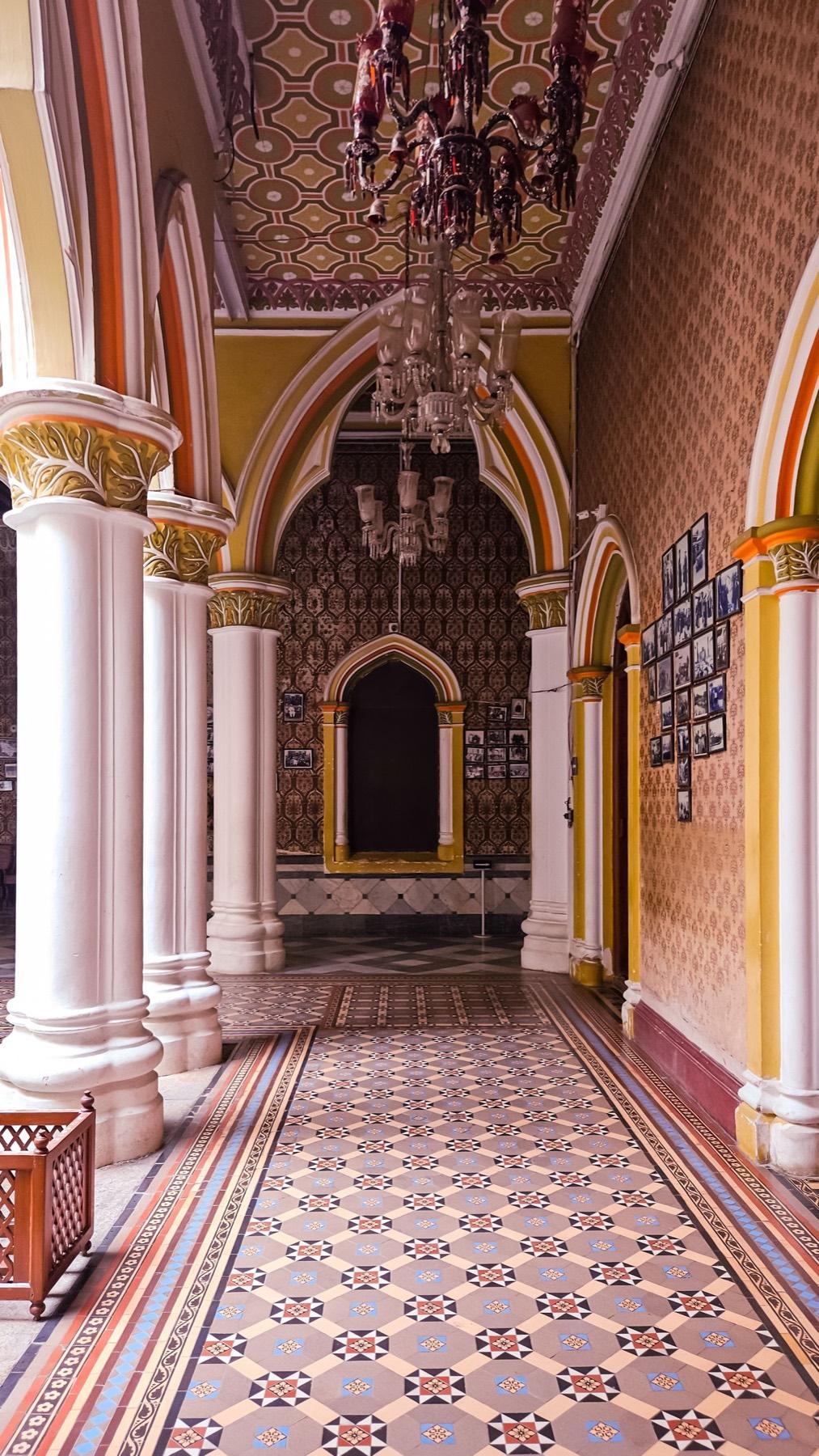 Ornate corridor with intricate mosaic flooring